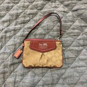 Coach wristlet tan with mauve